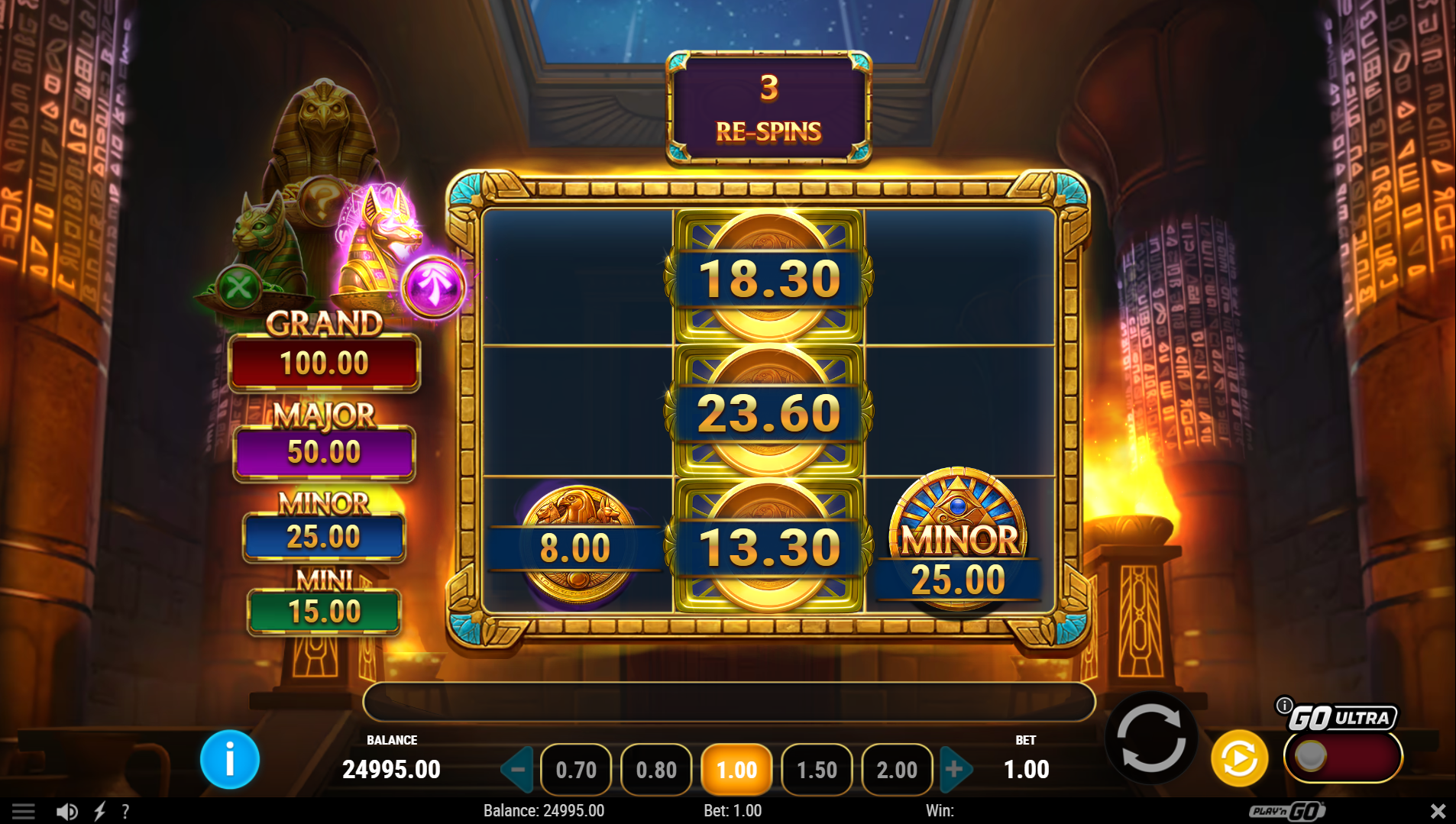 Temple of Three Hold'N Spin bonus feature in play with Cash Coin symbols locked in place