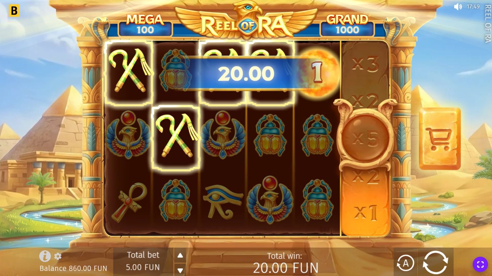 Reel of Ra base game showing the 5x3 Egyptian grid with falcon, scarab, ankh and pyramid symbols